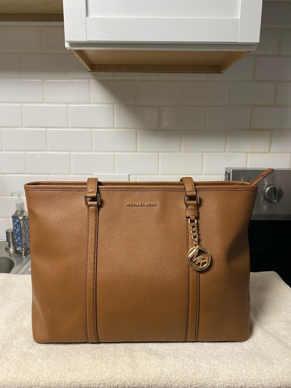 Michael Kors Cognac Saffiano Leather Tote with Gold MK Charm